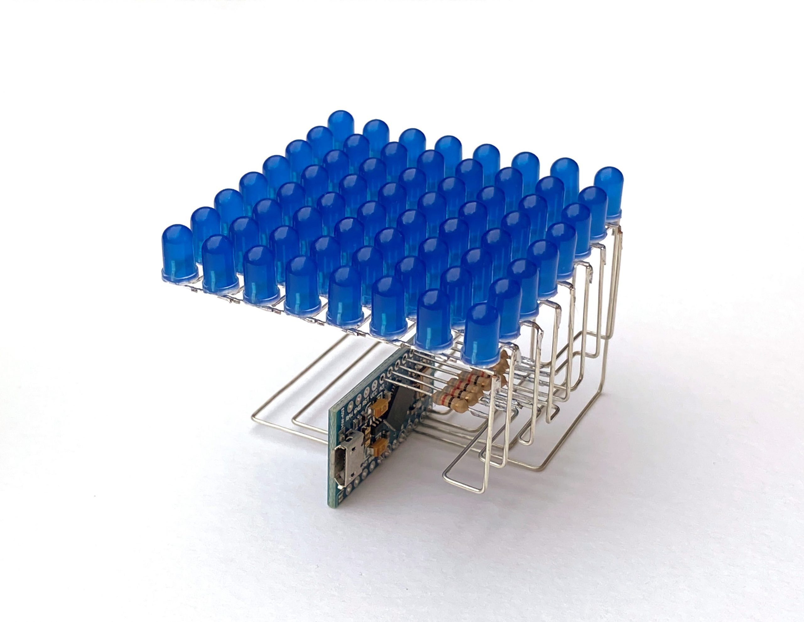 Freeform LED matrix inspired by the work of Mohit Bhoite. Wiring design by me. Hand soldered.